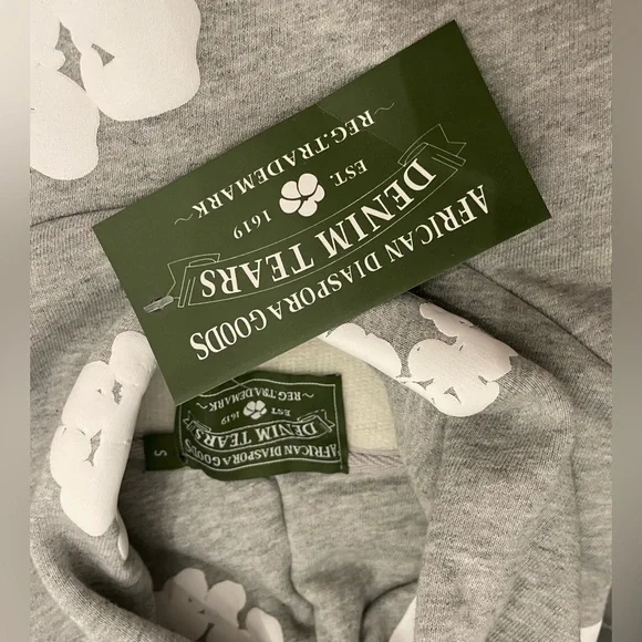 Brand new! Grey Denim tears hoodie with all tags and authentication.